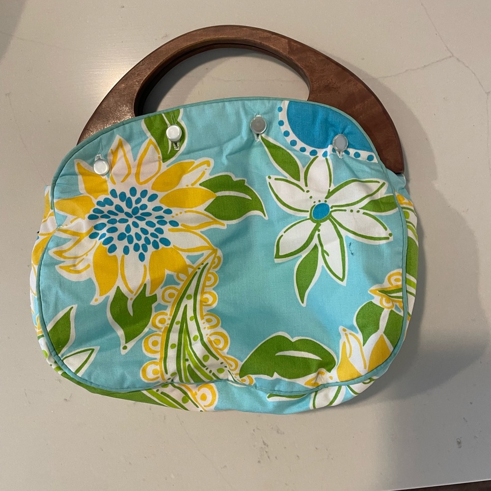 Bermuda bag with one reversible cover. Classic preppy!